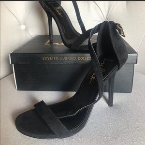 Lulu’s black Elsi ankle stap heel